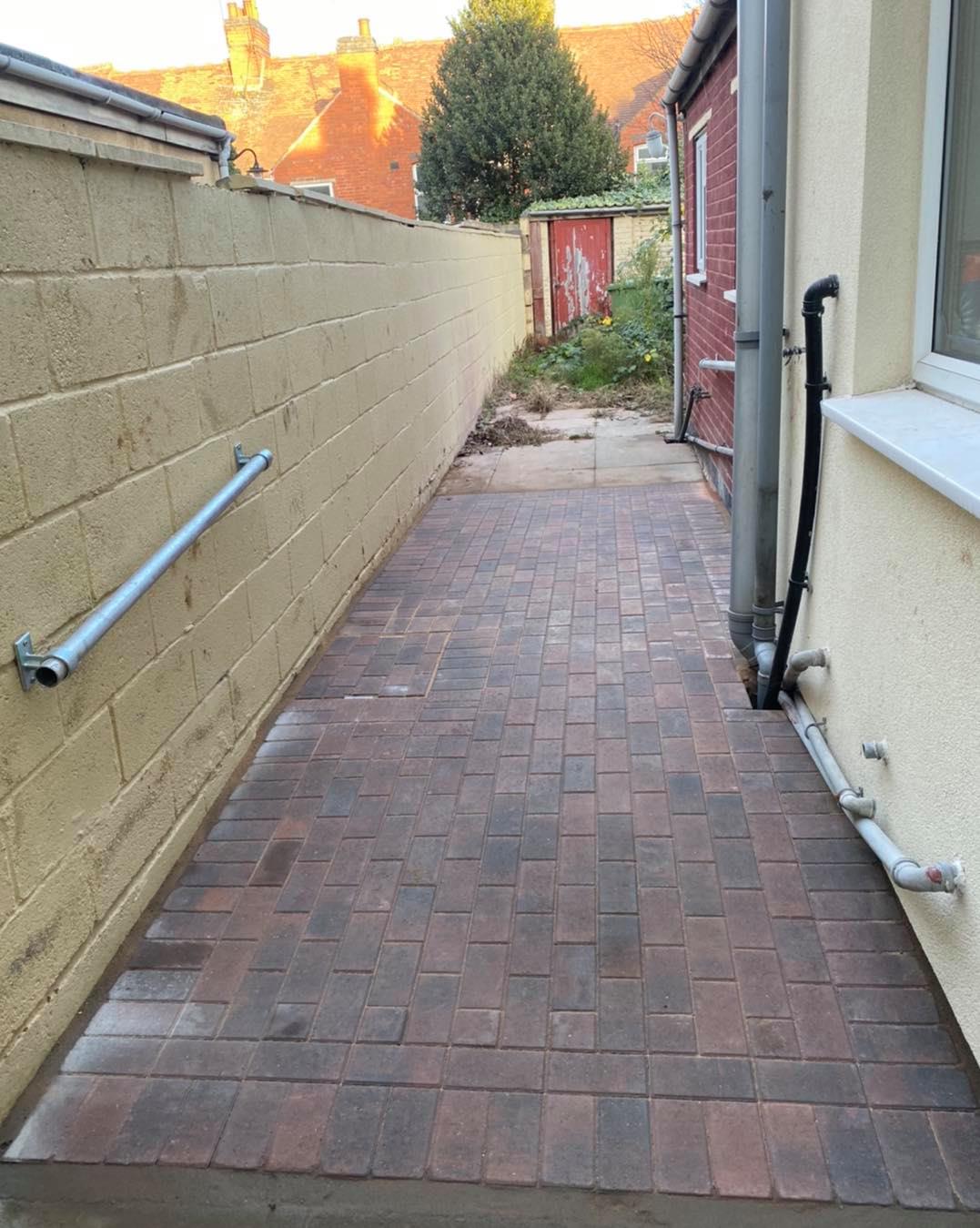 block paving installed in back at side of house