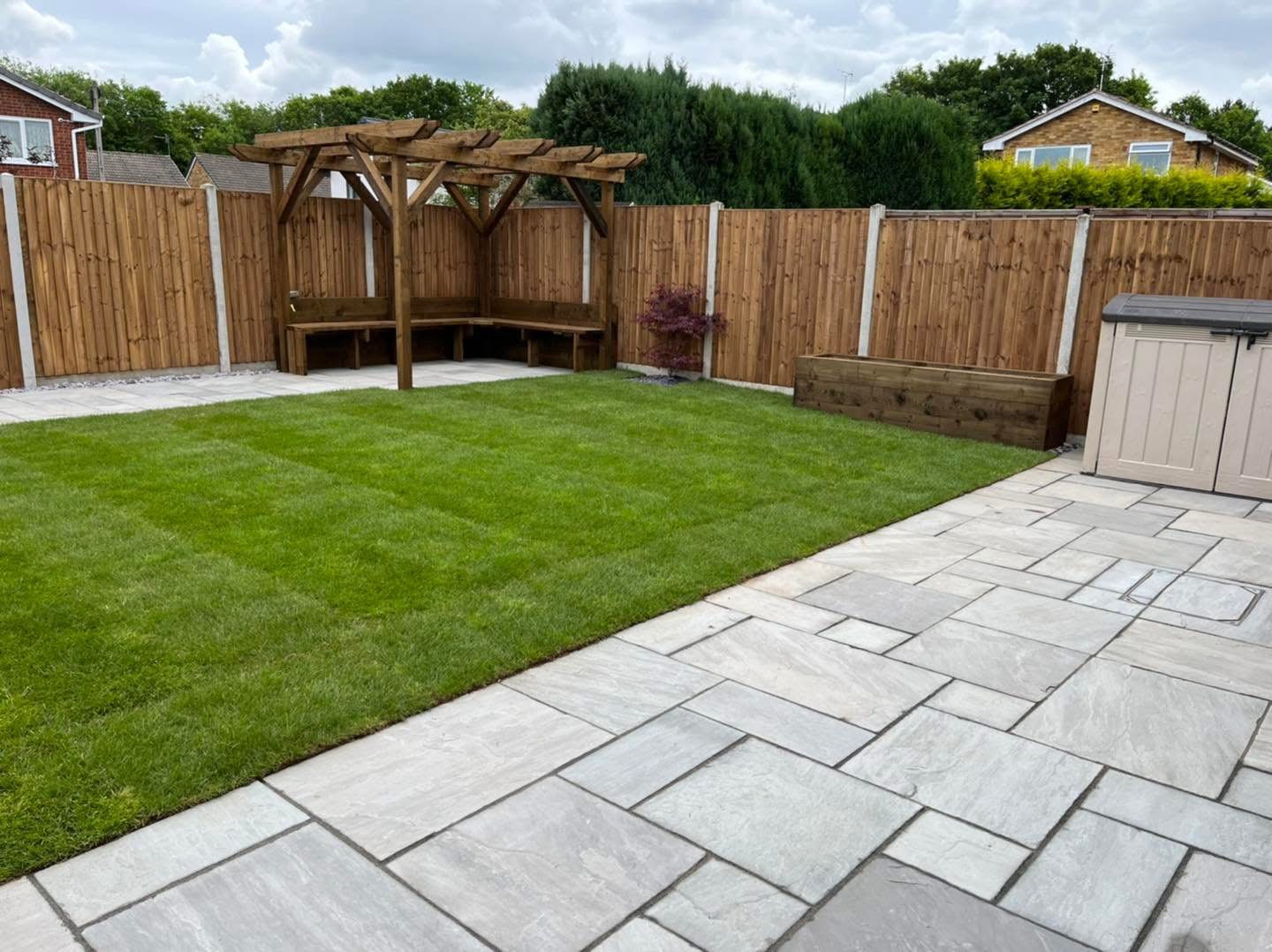 Garden redesign with porcelain patio tiles and new turf laid in Solihull